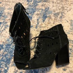 Ivanka Trump black suede peep toe booties.